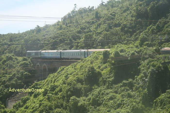 The Reunification Express Train on the Hai Van Pass between Da Nang and Hue