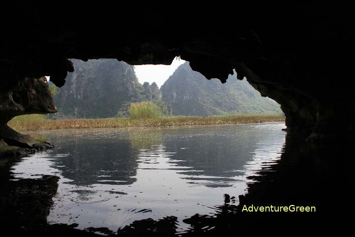 A cave which is visited on a boat trip at the Van Long Nature Reserve in Ninh Binh Vietnam