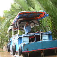 A boat in a coconut forest at Tien Giang