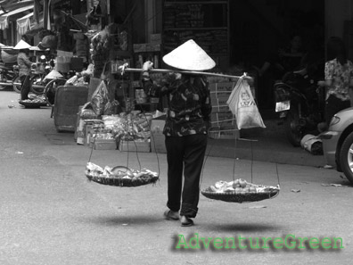 A street vendor in the Old Quarter of Hanoi, Vietnam