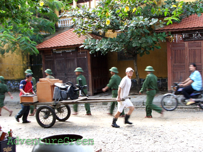 Cleaning the Old Town of Hoi An after a flood