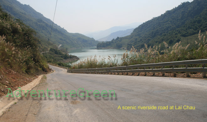 A scenic riverside road at Sin Ho