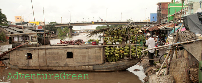A boat transporting bananas to the market at Bac Lieu