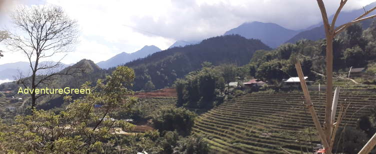 A mountain view from the path to the Cat Cat Waterfall