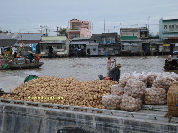 A fruit boat at the Cai Rang Floating Market