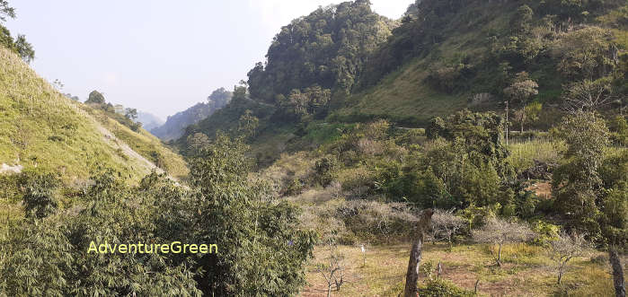 The scenic landscape with a small road going up into the Hang Kia Valley