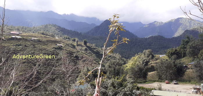 Houses on a mountainside in Sapa viewed from the path to the Cat Cat Village