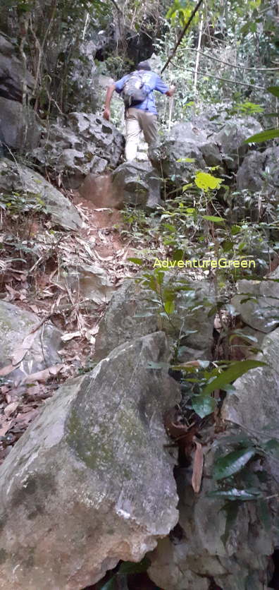 Steep, rocky and slippery hiking path at Pu Luong