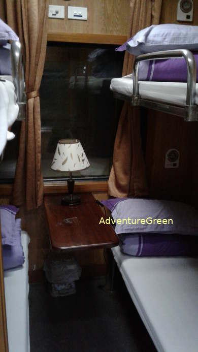 a 4-sleeper cabin on the local train between Lao Cai and Hanoi Vietnam